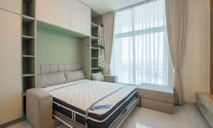 Stylish bedroom featuring a pull-down Murphy bed, elegant curtains, and bright lighting. - Photo by Waqas ilyas on Pexels